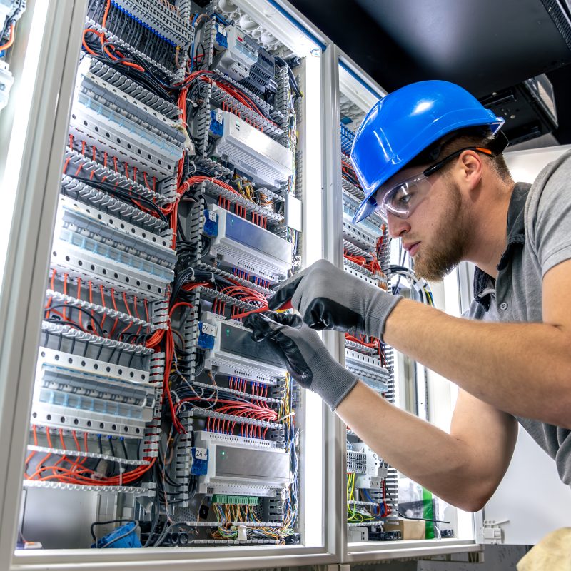male-electrician-uniform-working-switchboard-electricity Male electrician in uniform working in a switchboard. Electricity. High quality photo. Male electrician in hard hat. A male electrician solves a problem with electricity. SSUCv3H4sIAAAAAAAAA41PQY6DMAz8i88gBVJg4StVDyFxqVVKqsRstUL5+zqUaq+b04wnnhlvQA4GaE3T9QpVWZ9UV1bVVZWjrevypHvdNLpHc3VQgDOMMFRa90p/Kd22Xd0reQWMJpKFYQOa5zVyMEx+gUGUgIvDsEN0xD6QmYWlAiIbXiNGWRNmxXsSdecfv/OW51JQwuM6ZpCKf84uBZgJF/uT/VMuMqPZ484i3V+M4XFke77lihk+A1lapqOTnOIfb7x4zrt7Ant7J3csv8+4kUxDzoL1OXvj0B3yOj6I+UMDfhO+/n6nlH4B3lC4PIQBAAA=